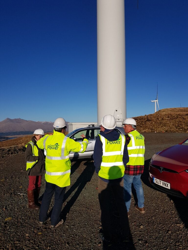 Rob Forrest(CEO) explaining the workings of the wind turbine to members of the Steering Group.